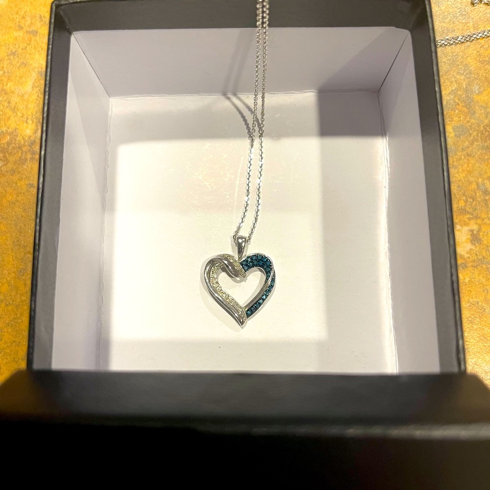 Steven singer heart necklace. Retails for 188.